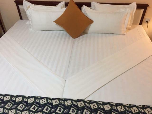 Mikaddo City Inn Кумаси Экстерьер фото